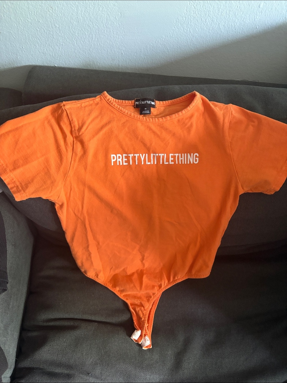 PrettyLittleThing Orange Logo Bodysuit